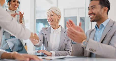 Image showing Handshake, partnership and business people clapping hands in celebration, congratulations or motivation. Collaboration, applause and senior woman shaking hands with company partner after success deal