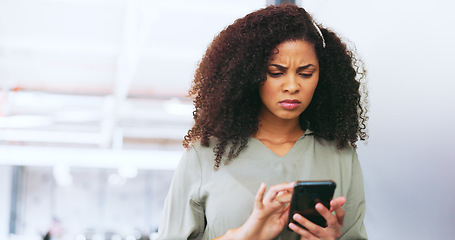 Image showing Sad, reading communication and black woman on mobile app, email and website with phone in an office. Frustrated, confused and business woman with a glitch on a mobile, internet stress and scam