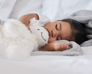 Image showing Sleeping, teddy bear and cute with baby in bedroom for relax, comfortable and dreaming. Innocence, young and rest with tired child at home for and napping with toy for bedtime, youth and sweet