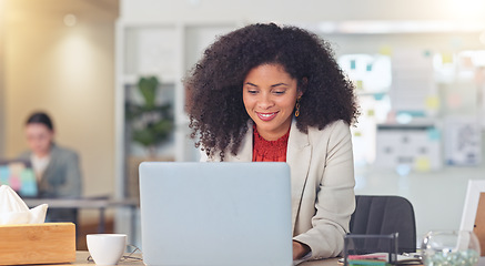 Image showing Real estate agent typing on laptop, thinking of creative property marketing advertisement to post on social media to sell a property. Confident, ambitious realtor with afro negotiating deal via email