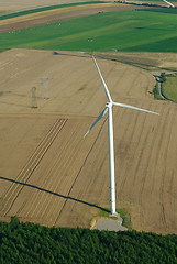 Image showing Overview of a windturbine and yellow field 