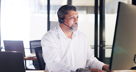 Image showing Call center, man and customer service for consulting, telemarketing and help online in office. Male agent, consultant and headset for client service, employee and conversation for speaking and advice