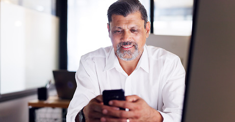 Image showing Business man, phone and office while typing for communication or chat about work while happy with network service, data and connection. Senior employee on social media for marketing and networking