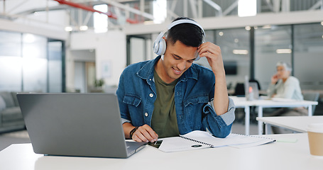 Image showing Music, laptop and a business man reading paperwork while working in his office on a project or report. Research, learning and documents with a male employee streaming or listening to audio at work