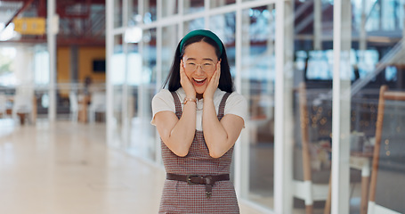 Image showing Wow, surprise and excited with a business asian woman looking shocked by putting her hands on her face in expression. Portrait, emoji or motivation with a female employee feeling shock frim good news