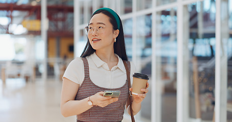 Image showing Phone, mall and Asian woman typing, social media or messaging. Technology, coffee and happy female with mobile smartphone for networking, internet browsing or web scrolling alone at shopping mall.