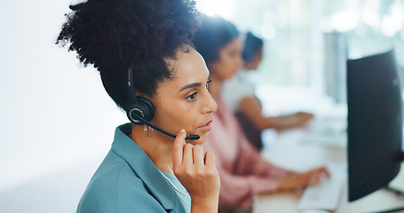 Image showing Contact us, crm or black woman in a call center consulting, communication or speaking of loan advice at office desk. Telemarketing, customer support or African agent helping a life insurance client C