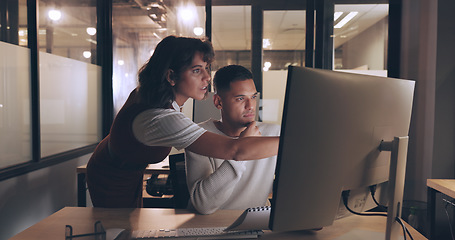 Image showing SEO, manager or digital marketing training, coaching or leadership by woman talking to an employee at office desk. Computer, mentorship or team leader helping worker with research strategy or advice