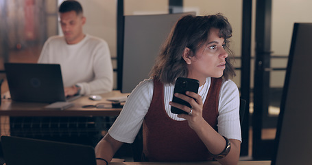 Image showing Business, woman and tired with smartphone, night or reading online in workplace, stress or burnout. Female employee, consultant or administrator working late, mental health or depression for schedule