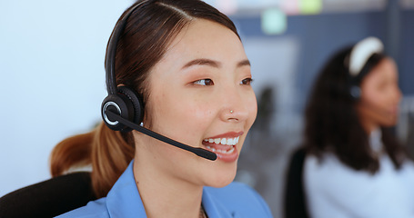 Image showing Call center, telemarketing and face of a woman consulting, giving support and online help in crm. Contact us, communication and Asian customer service worker talking with advice and technical support