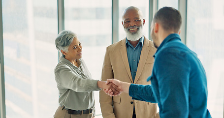 Image showing Handshake, welcome and thank you with business people in office after interview with manager. Shaking hands, diversity and b2b partnership, collaboration or happy business deal, success and teamwork