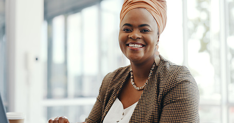 Image showing Portrait, face or black woman in office building with a happy smile working on email marketing online at desk. Human resources, startup or African worker in with motivation, goals or success mindset