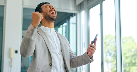 Image showing Success, phone and winner with businessman in office and celebration for deal, growth and stock market target. Wow, goals and good news with fist of employee for achievement, future and sale