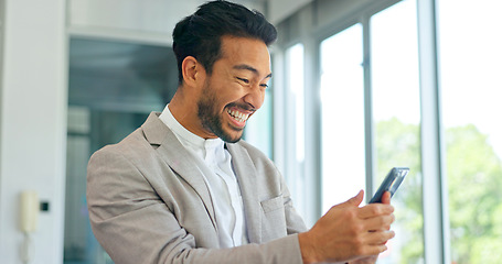 Image showing Success, phone and winner with businessman in office and celebration for deal, growth and stock market target. Wow, goals and good news with fist of employee for achievement, future and sale