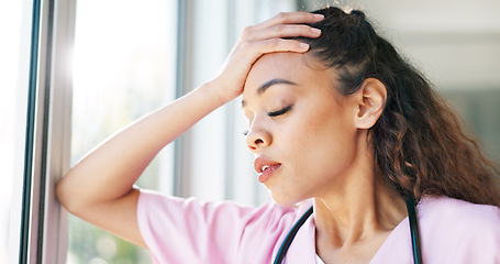 Image showing Nurse, thinking or stress headache by window in hospital, clinic or wellness theater and mental health burnout or anxiety. Exhausted, fatigue or tired healthcare woman in surgery mistake or work risk