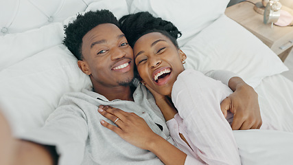 Image showing Selfie and happy influencer couple vlogging their honeymoon while lying in bed to love and relax together at home. Portrait of a loving black man and woman having romantic moment in the morning