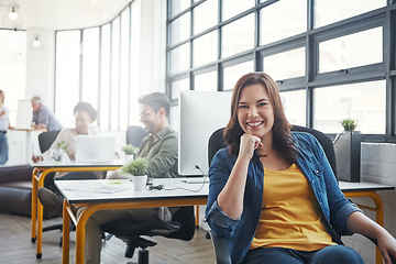 Image showing Woman, office portrait and smile by desk with business people, success and vision at web design company. Creative woman, motivation and modern office with career, goals and happy for job in New York