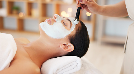 Image showing Skincare, beauty and spa facial with woman face mask at a wellness, health and salon. Relax, luxury and and girl resting while beautician hands apply exfoliation, peeling and hydration skin product