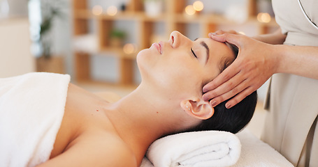 Image showing Wellness, spa and woman getting facial massage in beauty salon to relax. Calm, peace and luxury treatment for skin, massage therapy for stress relief, skincare and beautician massaging face of client