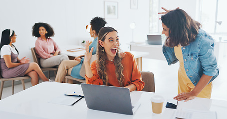 Image showing Success, fist bump or happy employees with a handshake in celebration of digital marketing sales goals at office desk. Laptop, winner or excited women celebrate winning an online business deal at job