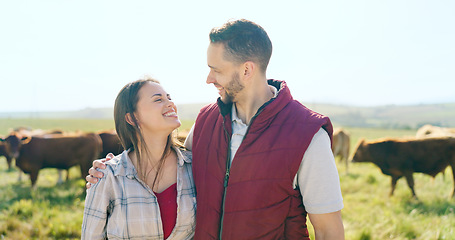 Image showing Cow, love and happy couple on a cattle farm hugging, bonding and enjoy quality time outdoors in nature. Smile, portrait and woman farming cows and harvesting animal livestock with a farmer on field