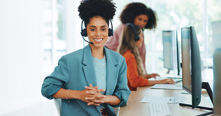 Image showing Black woman, call center and contact us with CRM and portrait in office with smile and professional in customer service or telemarketing. Customer support, work at desk and headphone with microphone.