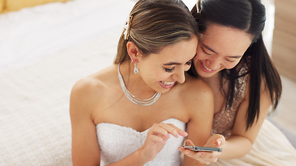 Image showing Friends, bride and bridesmaid smartphone selfie smile together for fun wedding photograph memory. Happy, joyful and cute women friendship with asian and caucasian woman looking at bridal pictures.