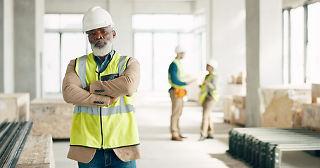 Image showing Construction, leadership and engineer with a black man architect standing on a building site with his arms crossed. Architecture, design and manager with a mature male supervisor and his team