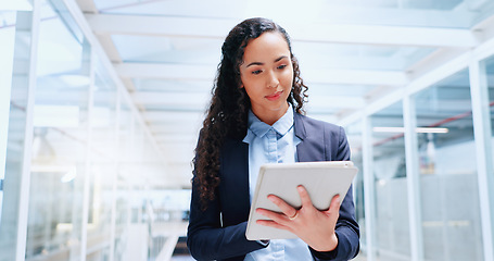 Image showing Business, woman and employee with tablet, modern office and typing for online research, data analysis and website launch. Female entrepreneur, lady and ceo with digital marketing and search internet