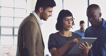 Image showing Tablet, collaboration and planning with a business team in the office, in discussion of the company growth strategy. Meeting, teamwork or partnership with a man and woman employee group at work