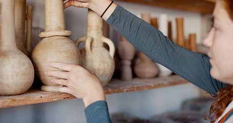 Image showing Pottery, woman artist and shelf for ceramic cups for shop, check quality for creative class or appreciate clay mold in workshop. Hobby, female entrepreneur or prepare art items to sell or for startup