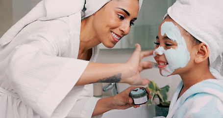 Image showing Mom, daughter and home skincare face mask of family bonding together with a house spa day. Mama and girl with beauty treatment, facial serum and skin moisterizer cream looking happy with a smile