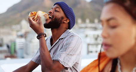 Image showing Couple, eating pizza and bonding on city building rooftop in Miami, Florida while dancing, enjoying and relaxing. Smile, happy black man and woman with fast food in relax tourist location for summer