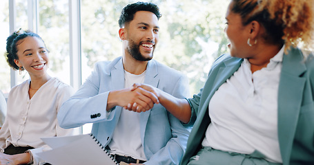 Image showing Recruitment, handshake and business people networking in job interview waiting room, happy and friendly. We are hiring, job opportunity and hand shaking by man and woman relaxing in line at startup