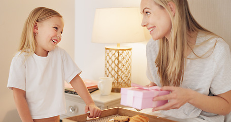 Image showing Breakfast, child and mama with a gift on mothers day in the morning to celebrate her mommy at home. Smile, Love and happy girl giving parent a present box and a croissant with cookies in a bedroom