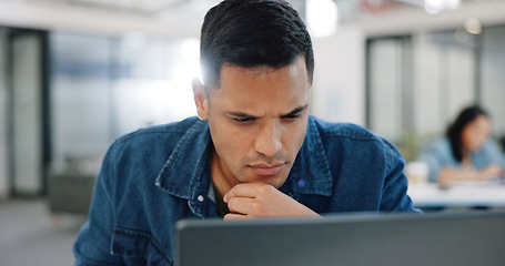 Image showing Thinking, confused and man at laptop writing notes for project planning at web design company. Professional ux employee at office working, thoughtful and focused on email idea for client.