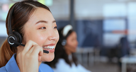 Image showing Call center, customer support and sales with an asian woman consultant working on a headset in her office. Contact us, ecommerce and retail with a female employee consulting on a call at work