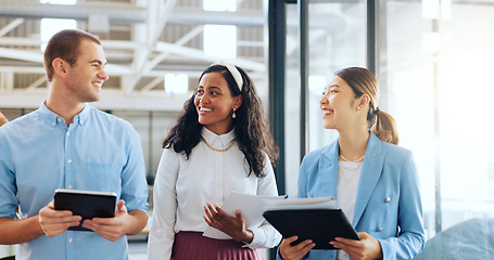 Image showing Office, communication and group of business people walking in office. Teamwork, collaboration and man and women with documents and tablet planning strategy, brainstorming ideas or casual conversation