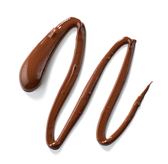 Image showing melted chocolate on white background