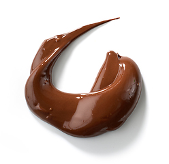 Image showing melted chocolate on white background