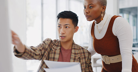 Image showing Leadership, black woman or manager mentoring an employee on SEO digital marketing strategy or feedback. Computer, report paperwork or advertising expert coaching, helping or training Japanese worker