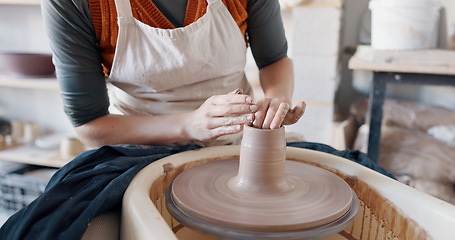 Image showing Pottery, woman creative and mold clay art piece for class, hobby or relax in workshop or studio. Creativity, girl student or female sculptor use wheel spinning, shape art or ceramic design workspace.