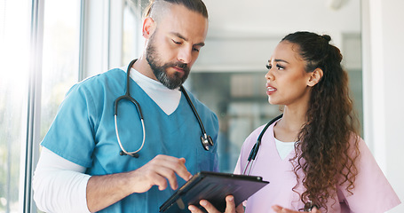 Image showing Healthcare, tablet and medical team surgeon and nurse talking, discussion and communication about surgery. Man and woman hospital staff meeting using technology for planning, innovation and medicine