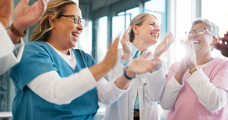 Image showing Doctor, support and applause in celebration for team unity, healthcare achievement or goal at the hospital. Group of medical professional clapping and celebrating teamwork, unity or victory at clinic