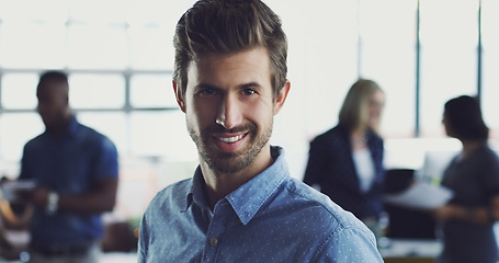 Image showing Portrait, confident and business man in an office with a smile, happy and proud of startup growth. Young, worker and employee with a positive mindset at his workplace as an entrepreneur