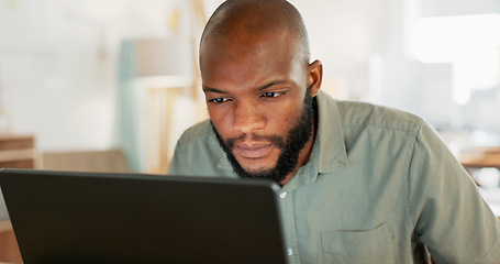 Image showing Email, phone and businessman working, planning and in communication with people on the internet at work. African manager, worker or employee typing on a laptop and reading on a mobile in an office