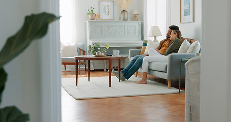 Image showing Movie, coffee and couple watching tv or streaming an online series via a subscription for fun entertainment at home. Relaxing, smile and happy woman enjoying a film together on a sofa with partner