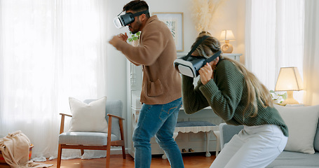 Image showing Gaming, vr and metaverse with couple in living room for future, technology and 3d digital games. Innovation, virtual reality and internet with man and woman gamer at home for relax, happy and boxing