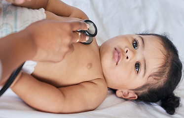 Image showing Healthcare, heartbeat and baby with a doctor for a checkup, medical attention and consulting. Hospital, patient and above of a child with a pediatrician for an exam, test and examination at a clinic