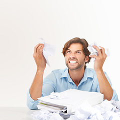 Image showing Angry, stress and businessman with crumpled paper for brainstorming, thinking of bad ideas and strategy. Corporate work, burnout and frustrated employee with mess of documents, paperwork and notes